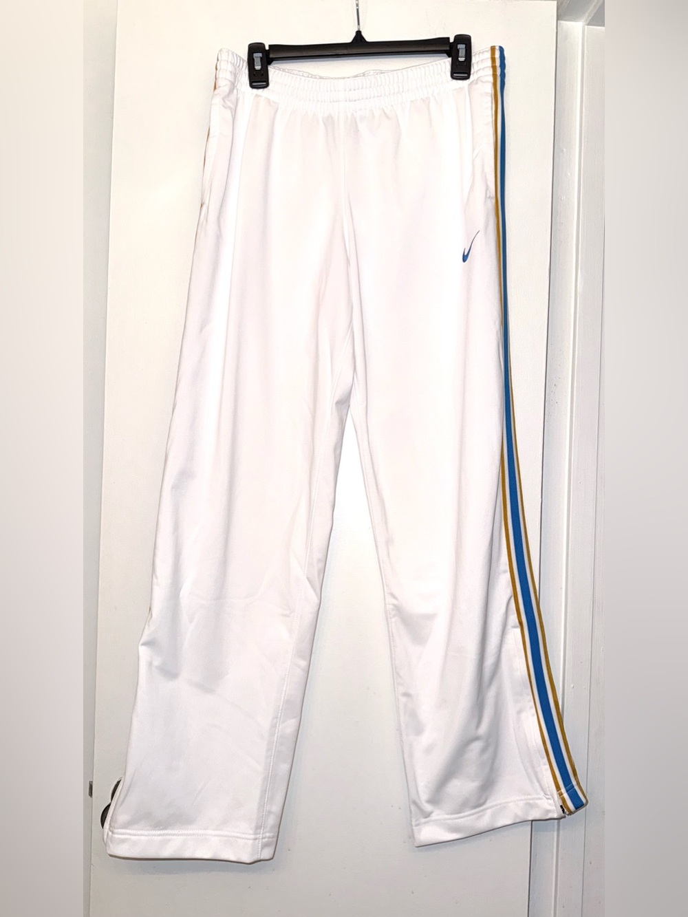 Vintage Nike track pants with blue and gold striped side detailing, size L, EUC